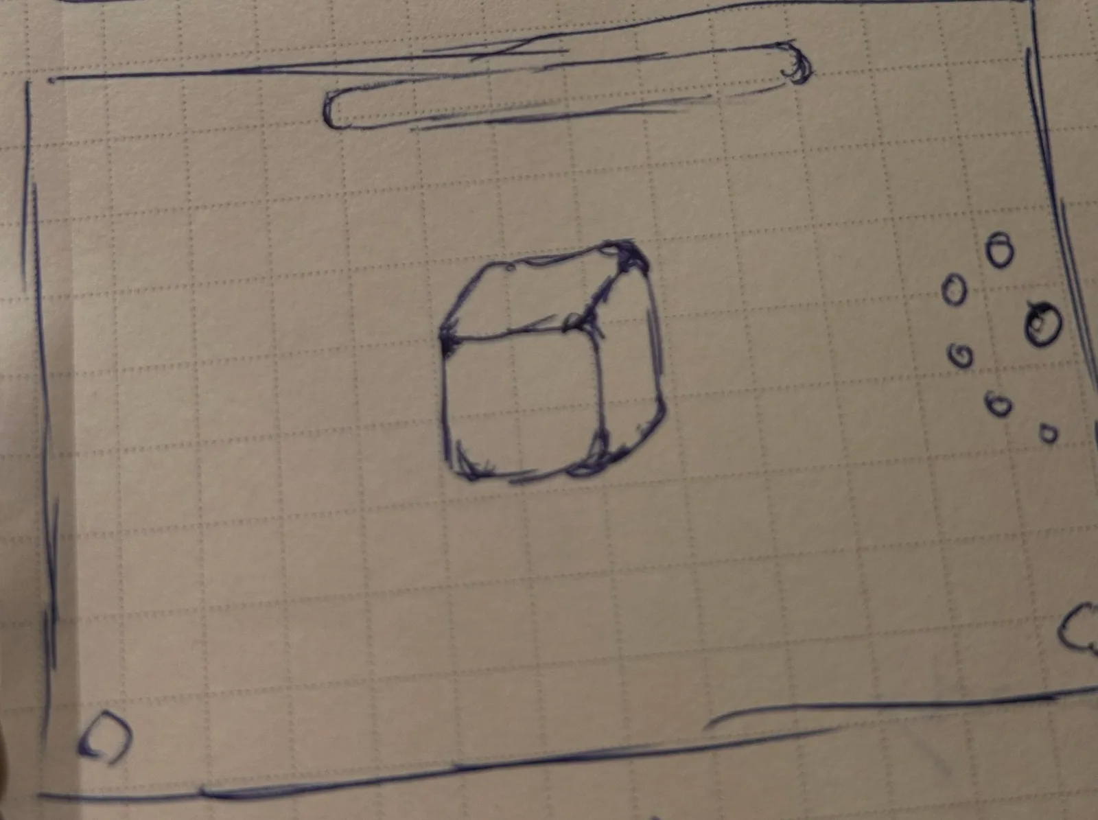 A ballpoint wireframe on grid paper: a wide panel with a pill-shaped bar at the top, a soft-cornered cube in the middle and a scatter of small rings to the right.